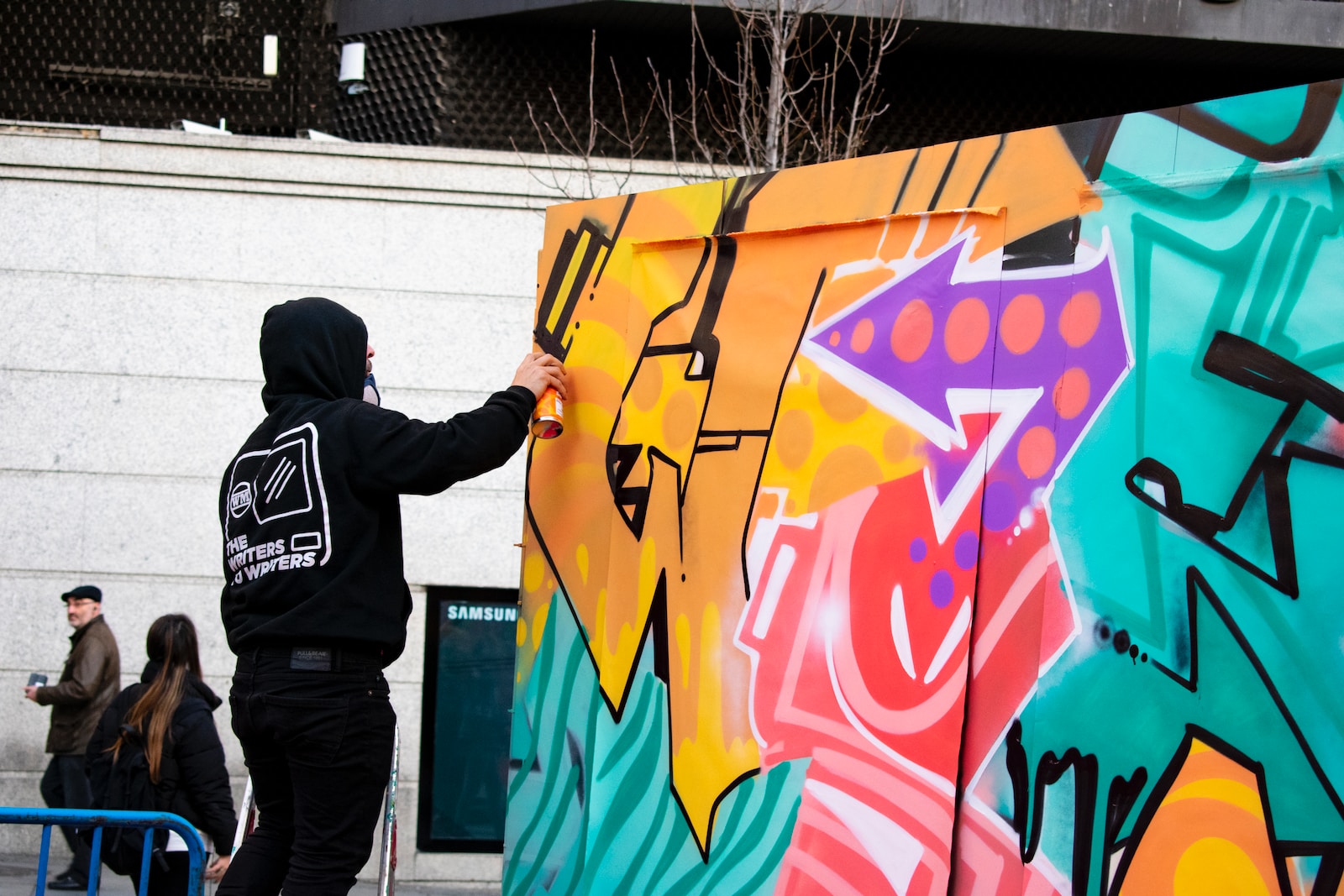 orange, teal, and pink graffiti